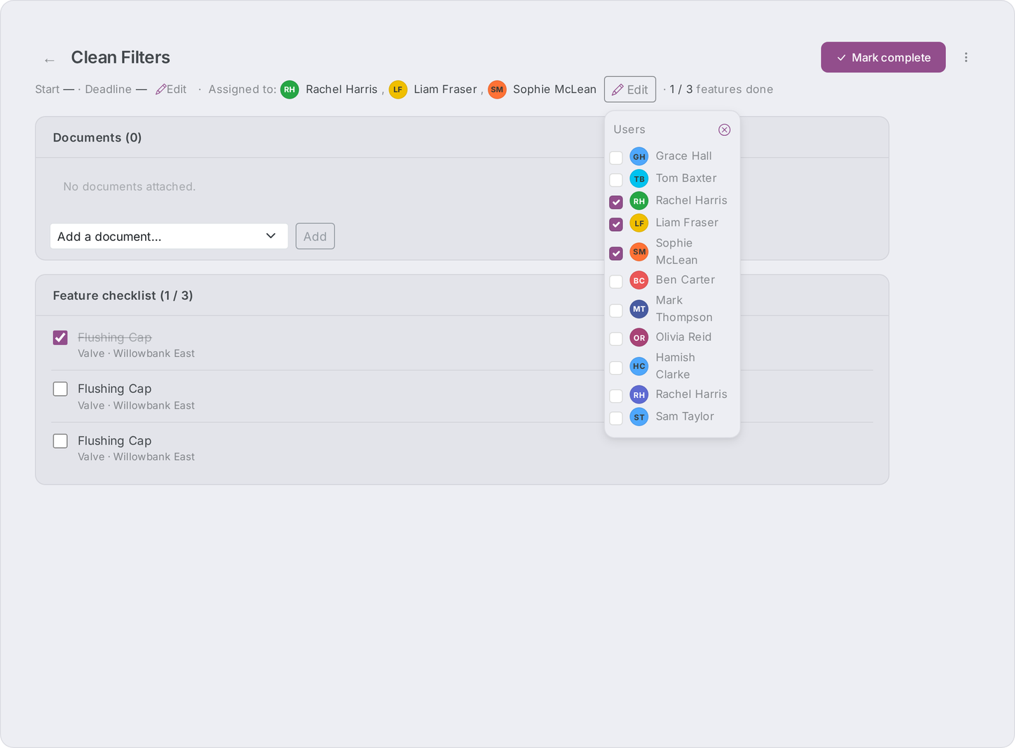 Edit assignees dropdown open with the Users heading, user checkboxes, and the clear (x-circle) control.