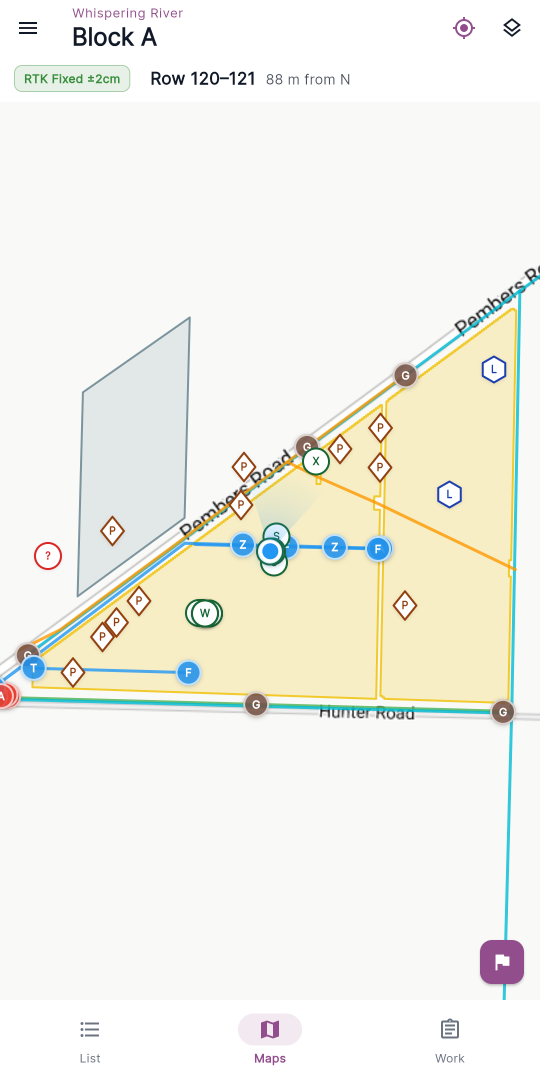 Mobile Maps tab over blocks, with several trouble spot markers and the flag FAB visible in the bottom-right corner.
