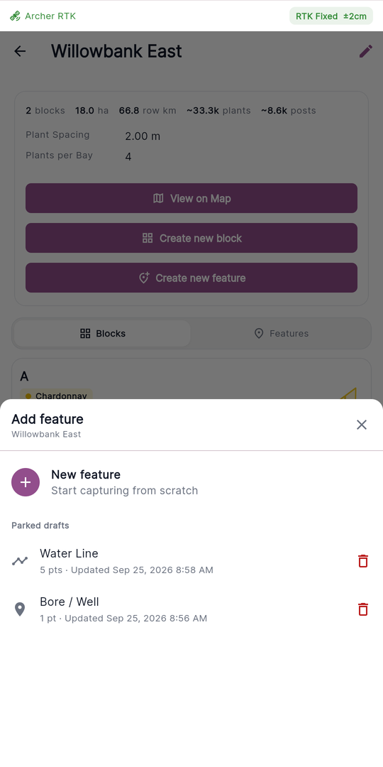 The Add feature sheet showing the New feature row and a Parked drafts list.