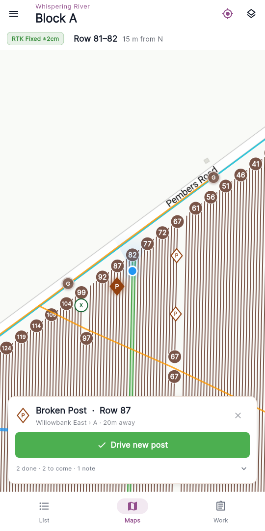 The folded trouble-spot detail card at the bottom of the map — category shape, type and row, the vineyard › block · distance line, the completion control (Hold to complete, or the currently available step buttons) and the More / summary fold line.