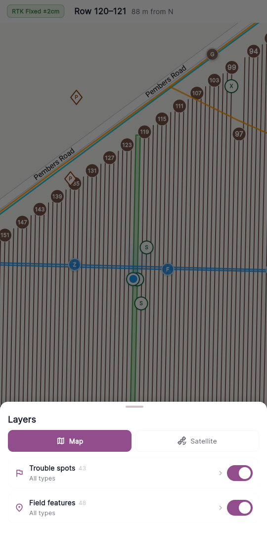The Layers sheet root view — the Map / Satellite segmented control at the top, with the Trouble spots and Field features layer rows below it.