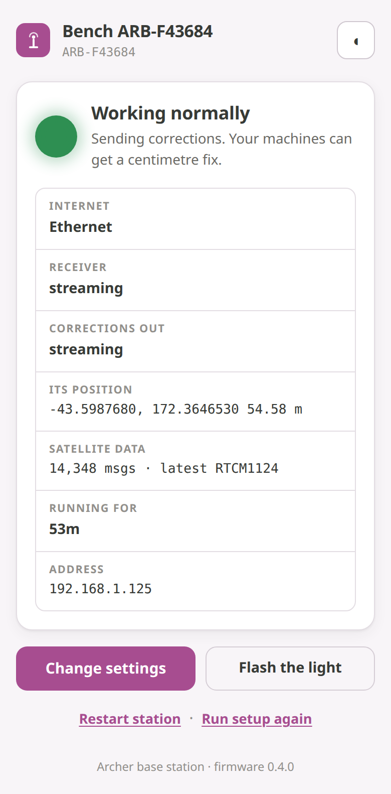 The status page of a working station — solid green, Working, with the Internet / Receiver / Corrections out / Satellite data rows and the Change settings and Flash the light buttons.